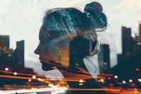 Young woman silhouette with double exposure effect combining urban night cityscape, light trails and feminine profile creating atmospheric mood piece.