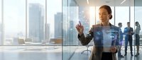 Professional businesswoman using holographic interface technology in modern office with city skyline view and colleagues in background.