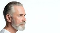Middle-aged man with gray hair and beard in profile view against white background, suitable for business, healthcare, and lifestyle design projects.