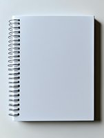 Blank white spiral notebook with metal binding on light background, minimalist stationery mockup for creative design and branding projects.