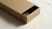 Brown cardboard sliding box partially open on neutral background for packaging and shipping solutions.