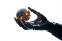 Glowing digital sphere with network connections floating above dark silhouetted hand against white background, representing global technology and artificial intelligence concept.