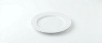 Empty white ceramic plate on clean white background isolated for kitchen dining restaurant menu design mockup.