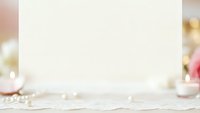 Blank white card on wooden table with soft floral background and pearls, mockup template for wedding invitations, greeting cards or branding materials.