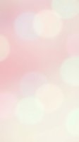 Soft pastel bokeh background with blurred circular light effects in pink, cream, and white tones. Ideal for overlays, web design, and creative projects.