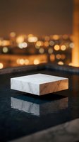 White marble product display podium on reflective surface with warm bokeh city lights background for luxury brand presentation and advertising.