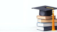 Stack of academic books with black graduation mortarboard cap and orange tassel on white background, symbolizing higher education achievement and academic success.