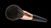 Makeup powder brush with rose gold ferrule and dark bristles, isolated on transparent background. Ready for beauty clipart, stickers, t-shirt design, and print on demand use.