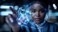 Young African American businesswoman interacting with futuristic holographic interface displaying digital data circles and technological elements in modern office.