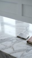 Modern minimalist workspace with marble desk surface and sleek metal business card holder in contemporary office interior for professional branding.