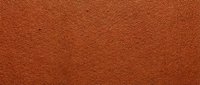 Warm terracotta textured fabric surface with subtle woven pattern, suitable for backgrounds, design projects, and interior decoration materials.