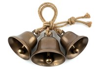 Vintage brass bells with rope loop isolated on white background, ready for holiday decorations, rustic home decor, and festive design projects.