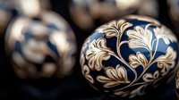 Decorative Easter eggs with intricate white floral pattern on deep blue background. Traditional folk art design featuring delicate leaf motifs and swirling ornaments.