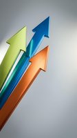 Three colorful arrows pointing upward representing growth, success and progress in business and finance concepts.