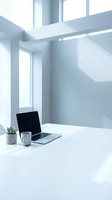 Modern minimalist workspace with laptop on white desk near window with natural sunlight shadows creating geometric patterns on wall for remote work productivity.