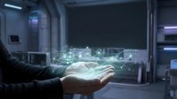 Person in business attire holding glowing digital hologram with network connections in modern tech office environment, representing innovation and data technology solutions.