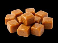 Soft caramel candy cubes piled together, isolated on transparent background, ready for confectionery branding, stickers, t-shirt design, print on demand, and sublimation projects.