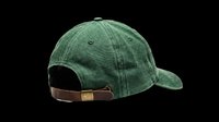 Vintage green denim baseball cap with brown leather back strap, isolated on transparent background. Ready for t-shirt design, clipart, stickers, print-on-demand products, and sublimation projects.