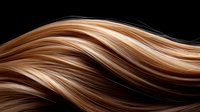 Flowing waves of brown and blonde hair strands create elegant curves against dark background, showcasing natural highlights and smooth texture for beauty and fashion designs.