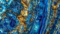 Luxurious blue and gold marble texture with flowing patterns and metallic veins for elegant backgrounds and sophisticated design projects.