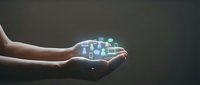 Hands holding glowing digital icons representing modern technology, innovation and connectivity for business presentations and tech concepts.