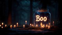 Glowing mason jar with "Boo" text surrounded by burning candles in dark mystical forest setting creates spooky Halloween atmosphere at night.
