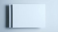 Blank white business card mockup with shadow on light gray background for branding and corporate identity design projects.