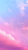 Dreamy pink and blue gradient sky with fluffy clouds and sunbeams creating ethereal atmosphere, suitable for backgrounds and romantic designs.