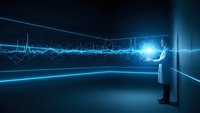 Businessman in suit analyzing glowing blue data visualization and financial charts in futuristic digital environment for business analytics presentations.