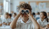 Curious elementary school student looking through binoculars in classroom, wearing white uniform polo shirt, with curly brown hair and playful expression.