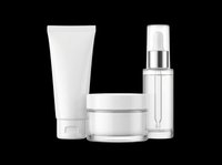 Blank white skincare packaging set with tube, jar, and dropper bottle, isolated on transparent background, ready for branding, mockups, print on demand, and T-shirt design use.