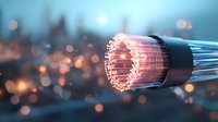 Glowing fiber optic cable transmitting data with light effects and bokeh background, modern digital communication technology concept for networking.