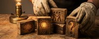 Wooden puzzle blocks with brain, lightbulb and question mark symbols arranged by hands in warm candlelit setting for creative problem solving concepts.