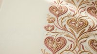 Elegant ornate floral pattern with decorative swirls and heart motifs in warm brown tones on cream background for luxury interior design and textile.