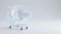 Transparent acrylic baby bassinet with wheels on white background, modern hospital nursery furniture for newborn care and medical facilities.