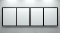 Four empty black picture frames hanging on white wall in gallery exhibition space ready for artwork display and interior design projects.
