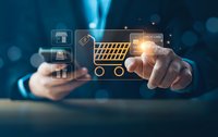 Businessman touching digital shopping cart icon with e-commerce symbols on virtual interface for online retail and mobile commerce applications.
