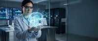 Female scientist in white lab coat examines glowing holographic brain projection in modern research laboratory, exploring neuroscience and AI technology.