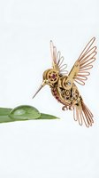 Steampunk mechanical hummingbird with exposed gears and copper wings hovering over green leaf on white background for creative design projects.