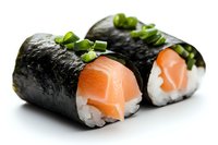 Fresh salmon maki sushi rolls with rice, nori seaweed and green onion garnish on white background, close up view of traditional Japanese cuisine.