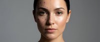 Young woman with natural makeup and glowing skin showcasing skincare routine and beauty treatment results for cosmetic and wellness advertising.
