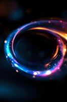 Glowing neon ring with vibrant blue, purple and orange light trails on dark background, sparkling particles creating magical energy circle effect.