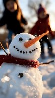 Cheerful snowman with carrot nose and coal smile in winter sunlight, wearing red scarf against blurred background of people enjoying snowy day outdoors.