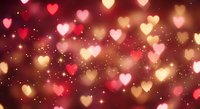 Romantic heart-shaped bokeh lights in warm red and gold tones with sparkling effects for Valentine's Day cards, wedding invitations and love-themed designs.