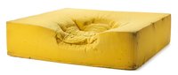 Yellow square pet bed cushion with soft fabric upholstery and comfortable center depression for dogs and cats on white background isolated.