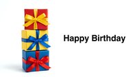 Stack of colorful gift boxes with ribbons and Happy Birthday text on white background, perfect for celebration greeting cards.