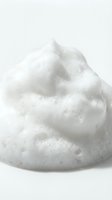 Fluffy white whipped cream or mousse isolated on light background, ready for food photography, dessert design, bakery marketing, and culinary content use.
