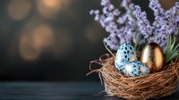 Decorative Easter eggs in natural nest with speckled blue and golden patterns, alongside blooming lavender sprigs against dark bokeh background.
