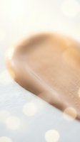Empty wooden bowl on white surface with soft natural lighting and bokeh effects for kitchen and dining concepts.