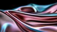 Smooth flowing waves of metallic pink and turquoise silk fabric create abstract luxury background with glossy reflective surface and elegant curves.